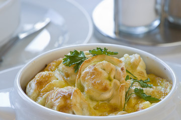 Pelmeni, meat dumplings, Dumplings in a pot