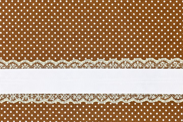 Brown retro polka dot textile background with ribbon