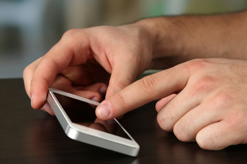 Hands holding smart mobile phone