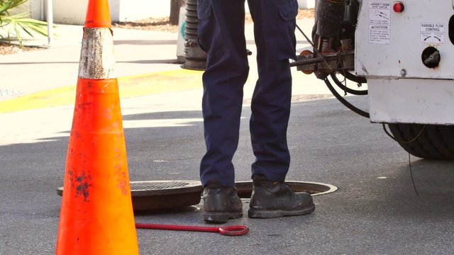 Men working around a manhole