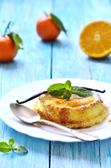 Curd souffle with orange and vanilla.