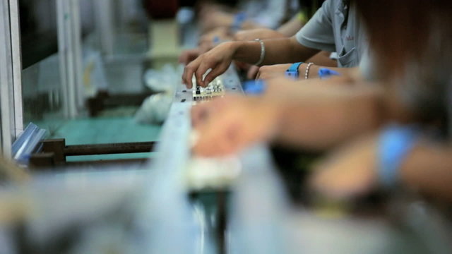 Chinese workers manufacturing PCBs, Mainland China, Time lapse