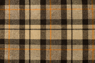 Scottish tartan pattern. Brown, orange plaid print as background - 77408978