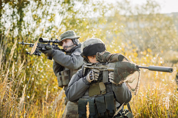 Army Rangers patroling on a battlefield