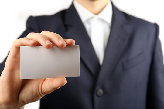 Businessman with business card, close-up