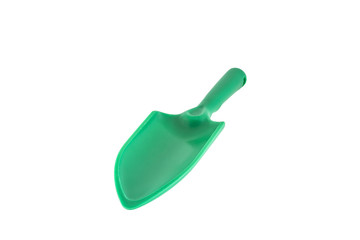 Green plastic shovels isolated on white background