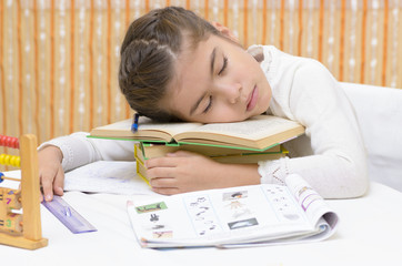 A little school girl sleeping