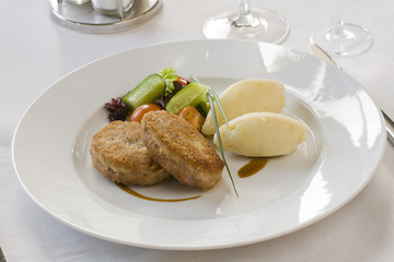 Cutlet and potatoes with vegetables