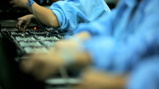 Factory assembly line production of PCBs, Mainland China