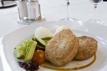 Cutlet and potatoes with vegetables