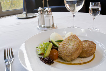 Cutlet and potatoes with vegetables