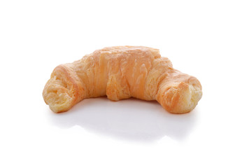 Fresh and tasty croissant over white background
