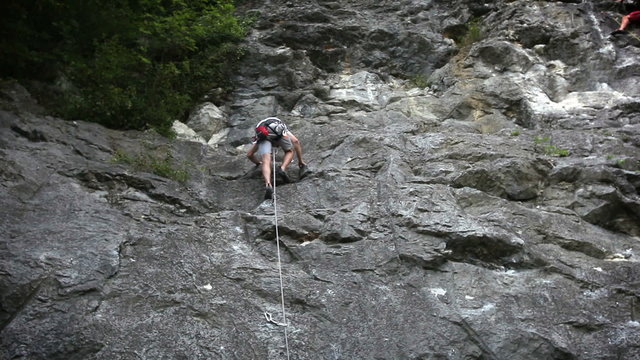 HD1080p: Man rock climbing in beautiful nature