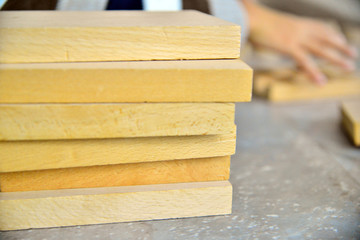 Boy playing with wooden bricks