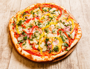 pizza on the wood background