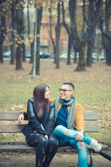 Fototapeta premium young couple in the park during autumn season outdoor