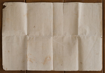 Very old crumpled brown paper texture.