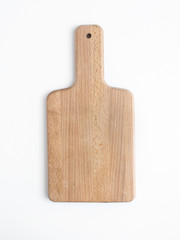 Rustic wooden cutting board on a white background