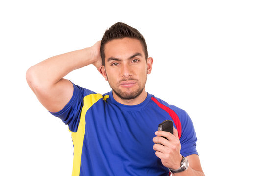 angry soccer fan wearing blue t-shirt watching game