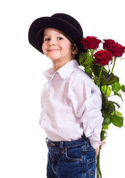 Little boy with red roses