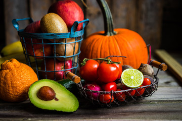 Fruits and vegetables on wooden background