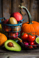 Fruits and vegetables on wooden background