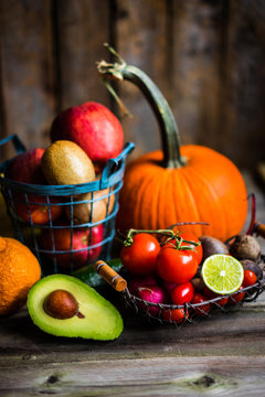 Fruits and vegetables on wooden background