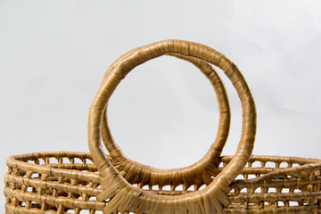 Wicker basket isolated on white background.