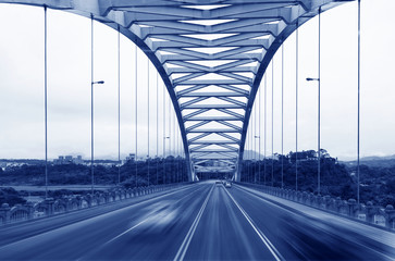 road through the bridge of a city