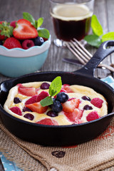 Pancake with berries fluffy and colorful