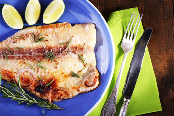 Dish of Pangasius fillet with rosemary and lime