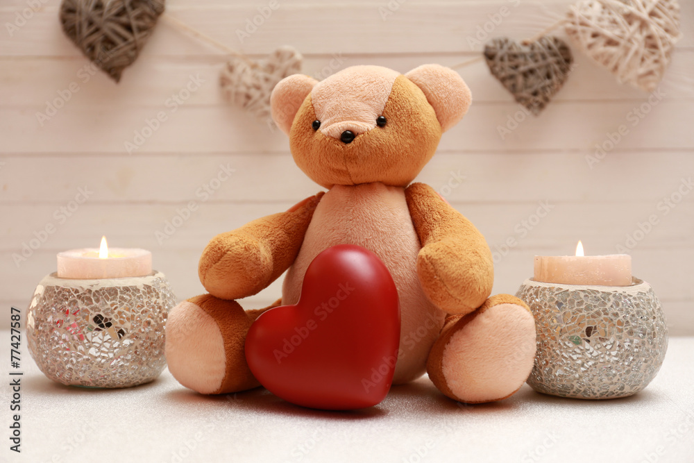 Wall mural Teddy bear with candles, love concept