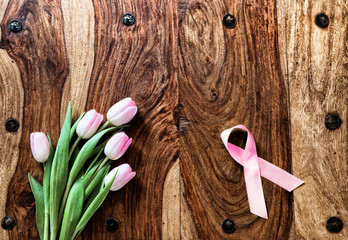 Tulips and Breast Cancer Ribbon on Rustic Table - 77427528