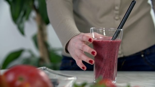 Tasting freshly made smoothie