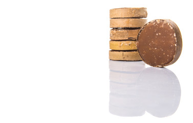 Round palm sugar over white background