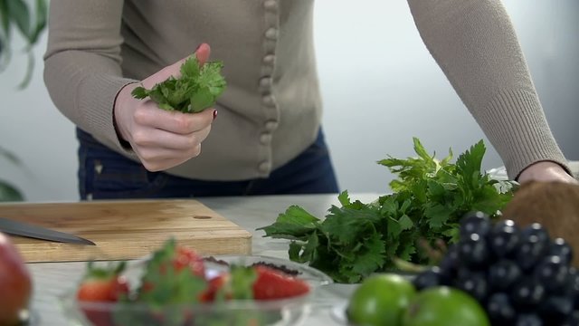 Picking mint leaves to decorate the drinks