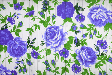 Fototapeta na wymiar rose vintage from fabric on white wooden background.