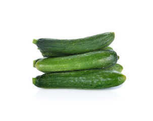 fresh green baby cucumbers on white background © nipaporn