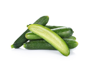 fresh green baby cucumbers on white background
