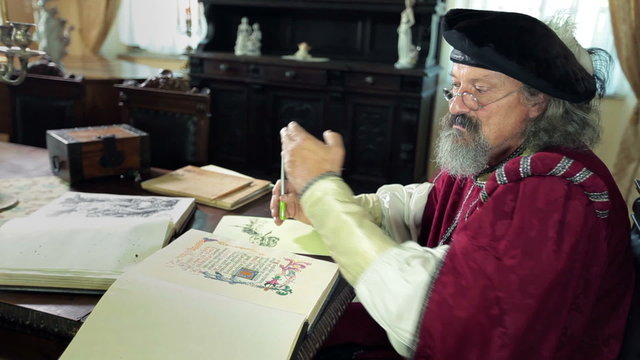 An old medieval scholar explaining his views