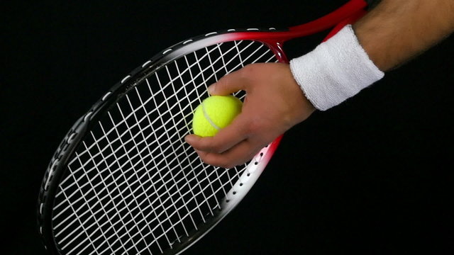 tennis player preparing to hit the ball with his racket