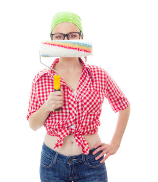 Worker female holding paint roller afore her face