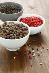 Peppercorns assorted in bowls