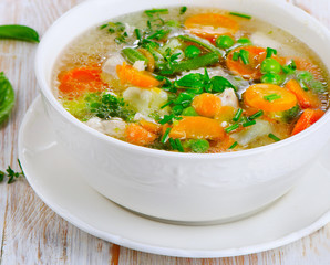 Soup on a wooden table