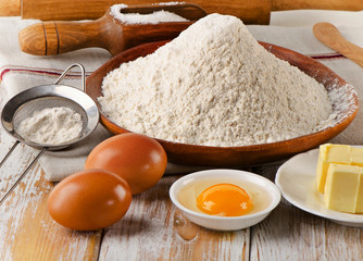 Baking ingredients  on  white wooden background