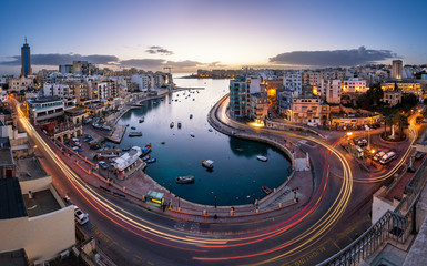 Aerial View on Saint Julien and Spinola Bay at Dawn, Malta - obrazy, fototapety, plakaty