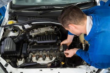 Mechanic working on an engine