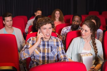 Annoying man on the phone during movie