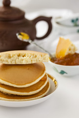 pancakes with delicious jam on white plate