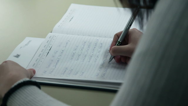 Writing after teacher dictation